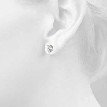 Oval Solitaire Basket Studs – Oval Lab Diamond Stud Earrings in 18K Gold | Just Brilliant – side view