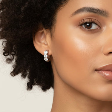 Lgd 3-Stone Huggie Earrings – Lab Diamond Earrings in 18K Gold | Just Brilliant – detail view
