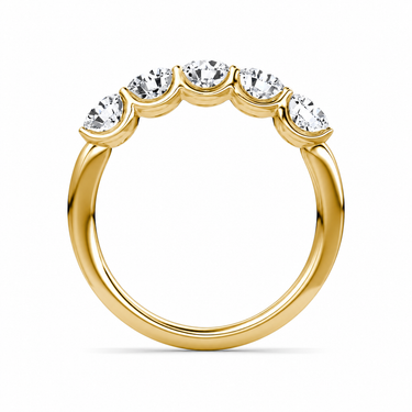 Just Brilliant Five Stone Diamond Band, Large version with Round Brilliant diamonds in 18K yellow gold, profile view. #jb-five-stone_large_round-brilliant_18k-yellow-gold_profile