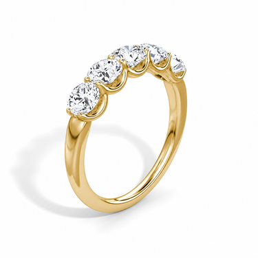 Just Brilliant Five Stone Diamond Band, Large version with Round Brilliant diamonds in 18K yellow gold, upright view. #jb-five-stone_large_round-brilliant_18k-yellow-gold_upright