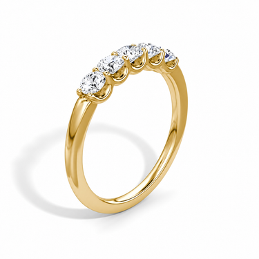 Just Brilliant Five Stone Diamond Band, Petite version with Round Brilliant diamonds in 18K yellow gold, upright view. #jb-five-stone_petite_round-brilliant_18k-yellow-gold_upright