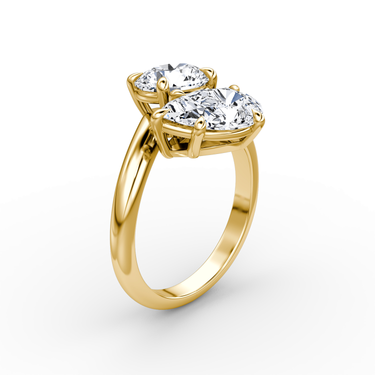 Just Brilliant Toi et Moi Bypass ring, plain band, round brilliant and pear diamonds, 18K Yellow Gold, upright view