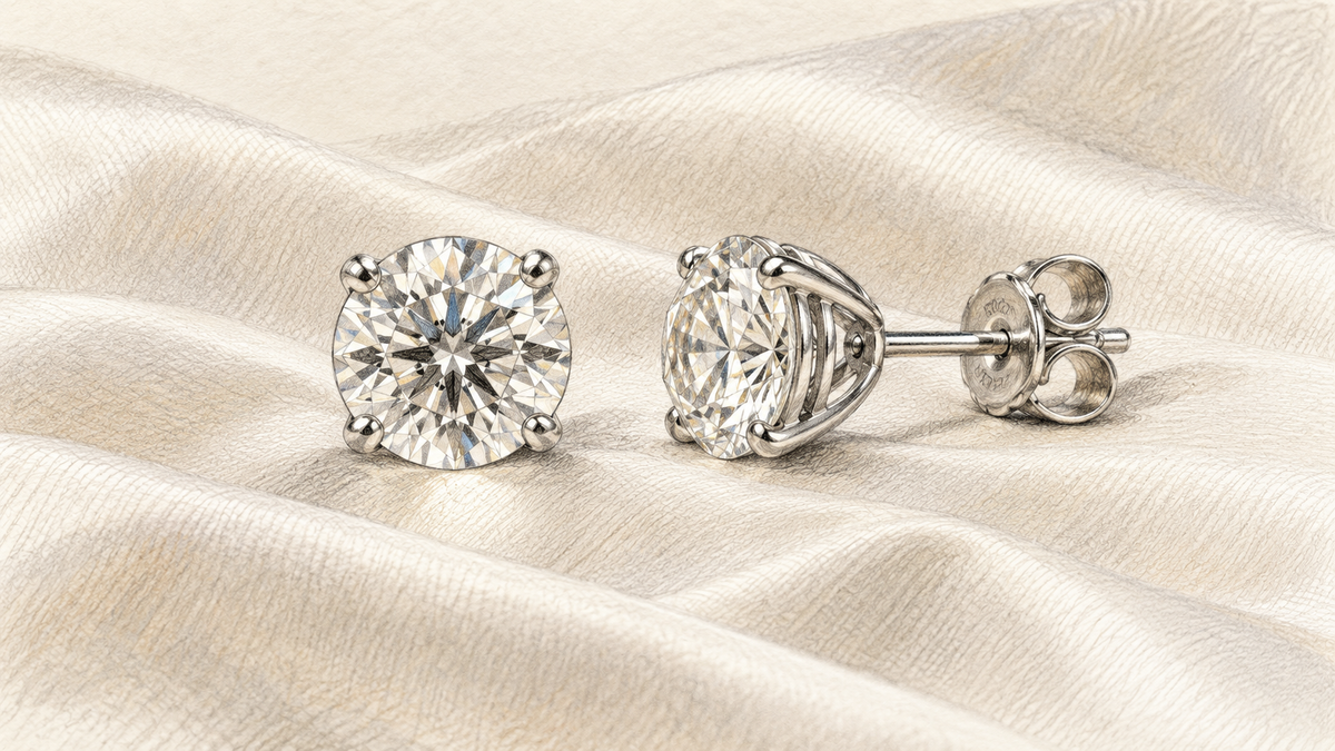 Pencil study of matched diamond stud earrings showing front and side construction.