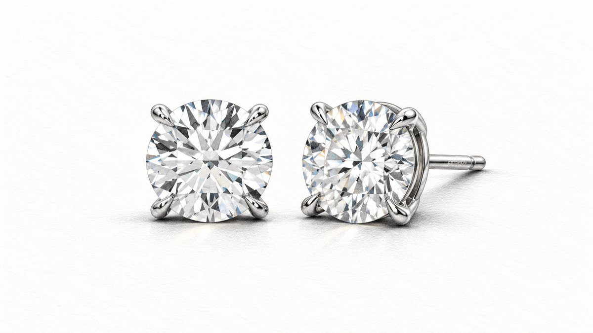 Pencil illustration of Just Brilliant four prong Solitaire Studs viewed from two angles.