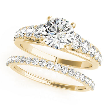 Graduating Trellis Round Engagement Ring – Round Lab Diamond Engagement Ring in 18K Gold | Just Brilliant – angle view
