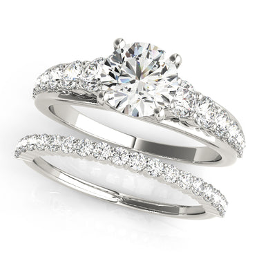 Graduating Trellis Round Engagement Ring – Round Lab Diamond Engagement Ring in 18K Gold | Just Brilliant – close-up view