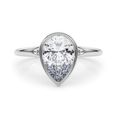 Bezel Set Pear Solitaire Engagement Ring – Pear-Shaped Lab Diamond Engagement Ring in 18K Gold | Just Brilliant – close-up...