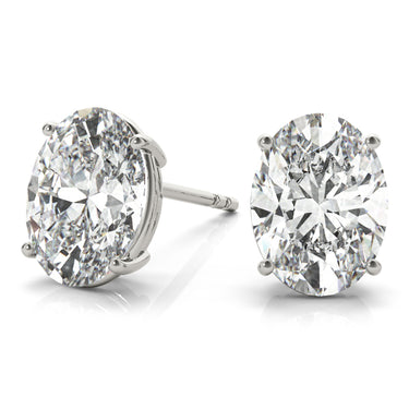 Oval Solitaire Basket Studs – Oval Lab Diamond Stud Earrings in 18K Gold | Just Brilliant – close-up view