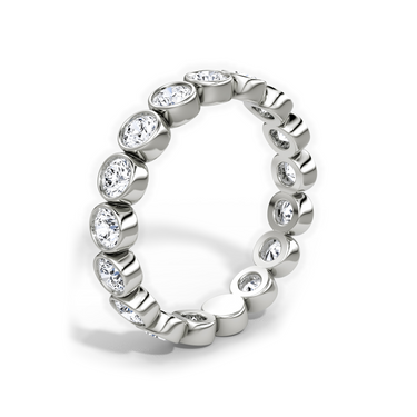 Just Brilliant bezel eternity band, upright view, white background with natural shadow