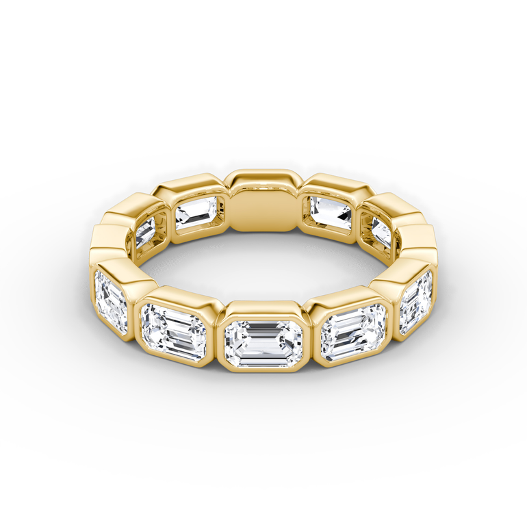 Just Brilliant bezel eternity band, emerald, 18K Yellow Gold, front view.