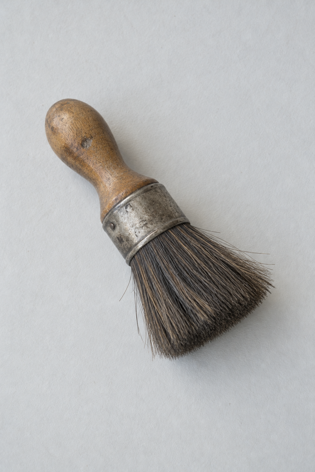 Original Just Brilliant craft study: a well-used wooden-handled dusting brush.