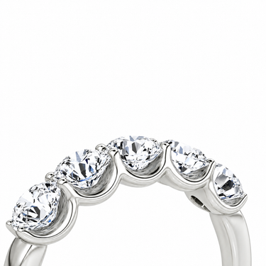 Just Brilliant Five Stone Diamond Band, Large version with Round Brilliant diamonds in 18K white gold, detail view. #jb-five-stone_large_round-brilliant_18k-white-gold_detail