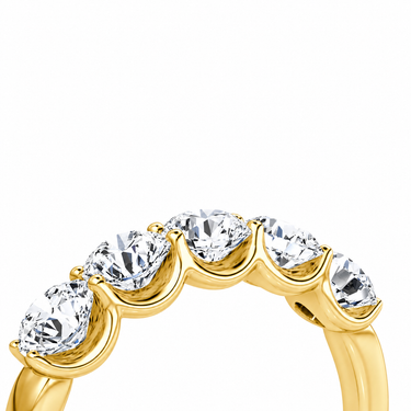 Just Brilliant Five Stone Diamond Band, Large version with Round Brilliant diamonds in 18K yellow gold, detail view. #jb-five-stone_large_round-brilliant_18k-yellow-gold_detail