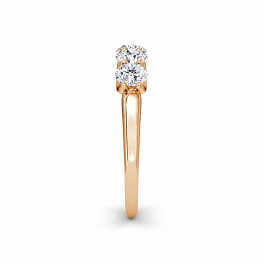 Just Brilliant Five Stone Diamond Band, Original version with Round Brilliant diamonds in 18K rose gold, side view. #jb-five-stone_original_round-brilliant_18k-rose-gold_side
