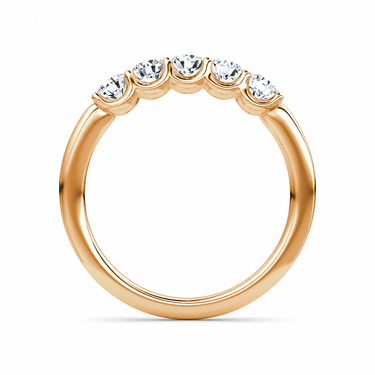 Just Brilliant Five Stone Diamond Band, Petite version with Round Brilliant diamonds in 18K rose gold, profile view. #jb-five-stone_petite_round-brilliant_18k-rose-gold_profile