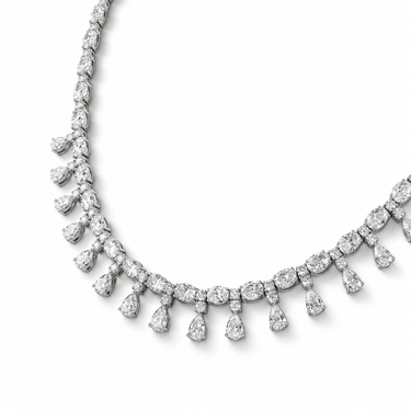 Frange de Lumière Diamond Necklace in 18K white gold with oval, round brilliant and pear-cut diamonds, angled detail