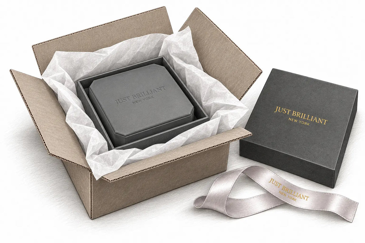 Pencil illustration of Just Brilliant’s embossed clipped-corner jewelry case cradled in its presentation carton and white tissue inside a delivery parcel.