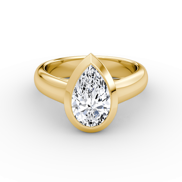 Just Brilliant Sculpture Bezel Ring, Pear, 18K Yellow Gold, front view.