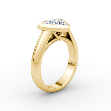 Just Brilliant Sculpture Bezel Ring, Trillion, 18K Yellow Gold, upright view.