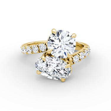 Just Brilliant Toi et Moi Bypass ring, pavé round brilliant and oval, 18K Yellow Gold, front view