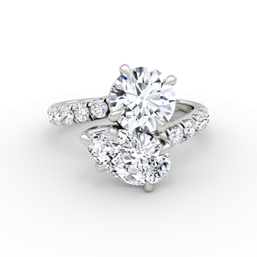 Just Brilliant Toi et Moi Bypass ring, pavé band, round brilliant and pear diamonds, 18K White Gold, front view