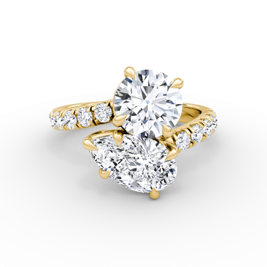 Just Brilliant Toi et Moi Bypass ring, pavé band, round brilliant and pear diamonds, 18K Yellow Gold, front view